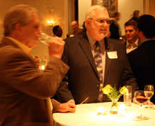 Tom Dempsey chats with guests during the cocktail reception in his honor