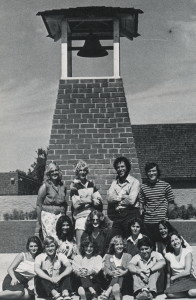 Lucien Bonnafoux with students in front of bell tower