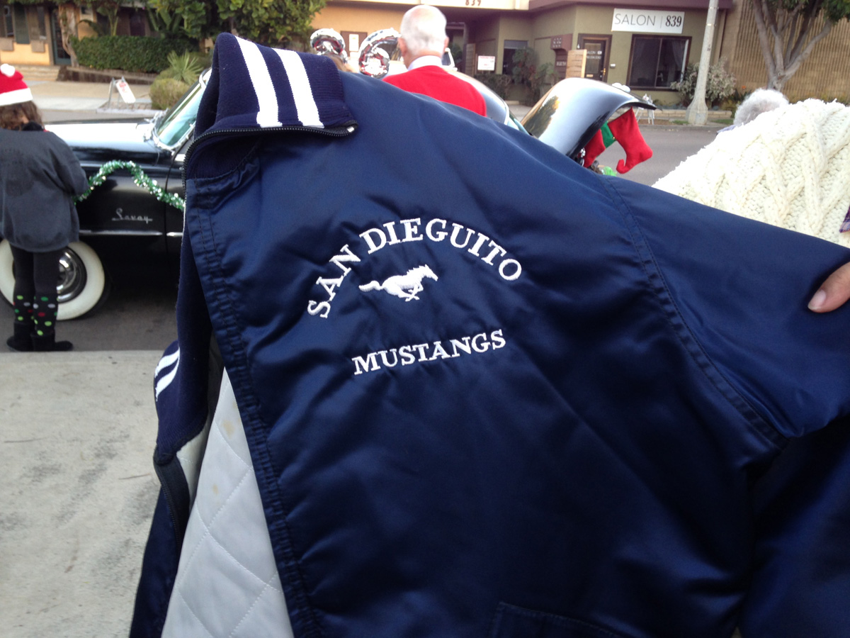 Jacket says "San Dieguito Mustangs"