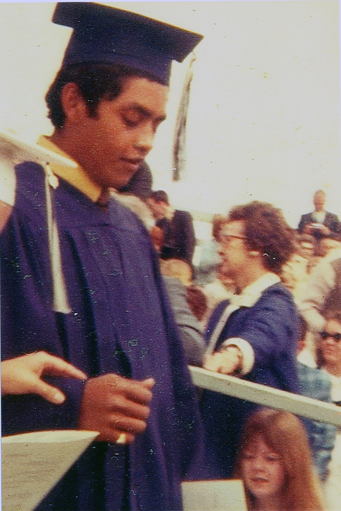 Armando in cap and gown