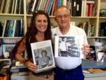 Jennifer and Mr. Zakoski holding up photos of Shirley Richardson and Bob Zakoski